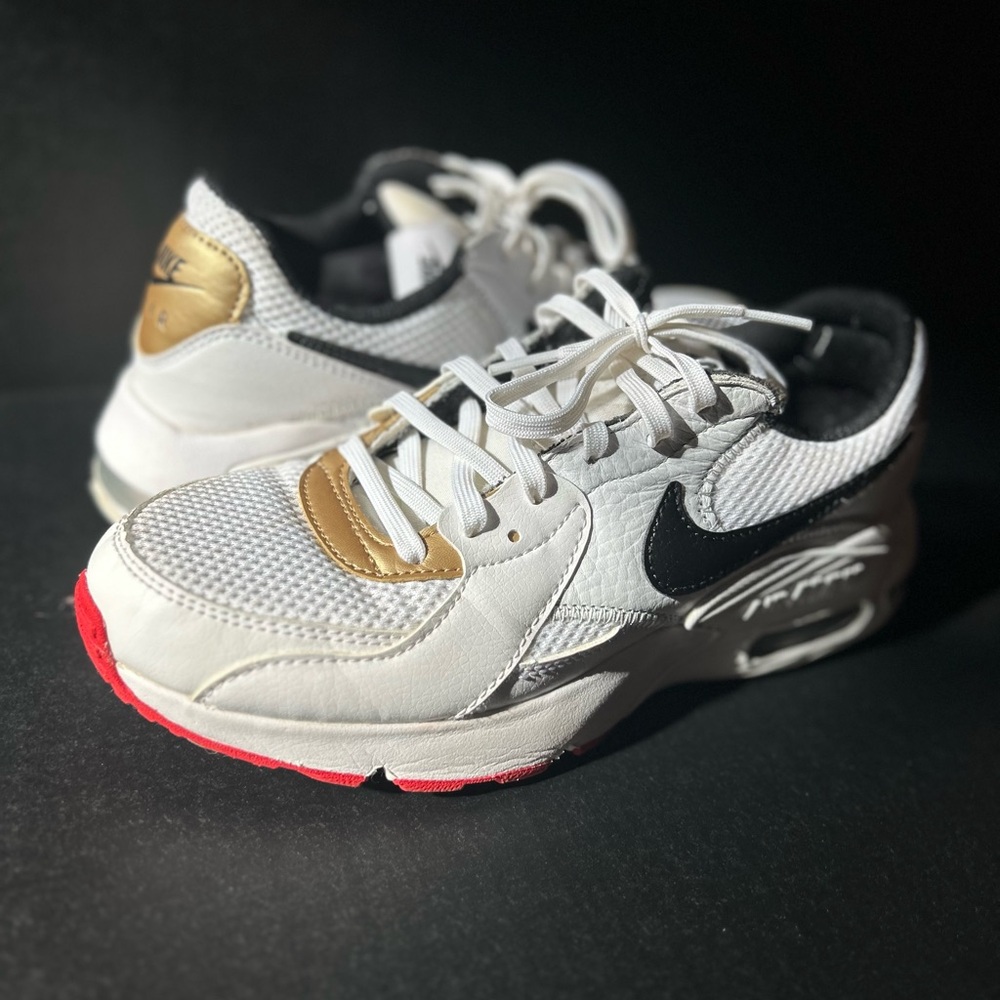 Nike White and Gold Athletic Sneakers